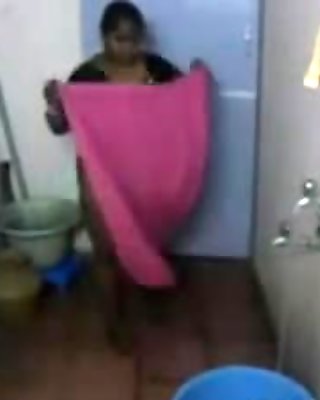 Fat indian chick takes a shower on hidden cam