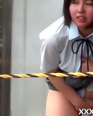 Cute Japanese school girl solo pussy plays outdoor